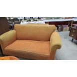 A 19th century? Victorian 2 seater drop arm sofa in ochre fabric.