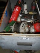 A box of wheels, electrical switches, motors etc.