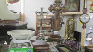 Two crucifixes, rosaries, Bibles, other religious books, bowl etc.