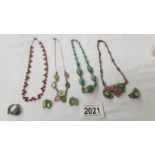 4 vintage necklaces (2 with matching earrings) and a vintage ring.