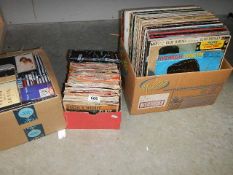 A quantity of 45 rpm and LP records.