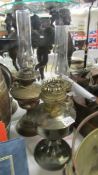 Three vintage oil lamps.