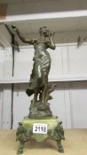 An Art Nouveau spelter figure signed Aug Moreau.