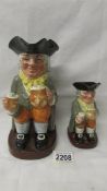 A Royal Doulton traditional Toby Jug Happy John, 8321 and a smaller example.