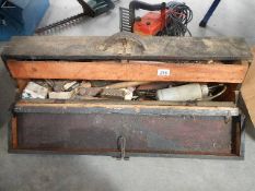 An old drop front tool box.