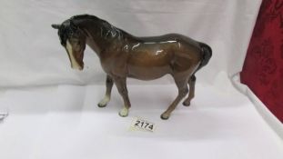 A Beswick horse.