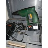 A cased Bosch drill.