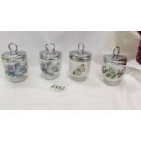 Four Royal Worcester egg coddlers with instructions for use.