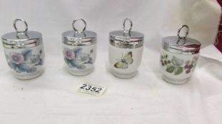 Four Royal Worcester egg coddlers with instructions for use.
