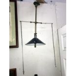 A Victorian brass ceiling gas light with on/off tags on chains