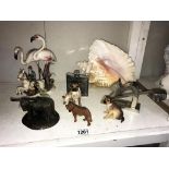 A mixed lot of animals including metal squirrel, nut cracker,