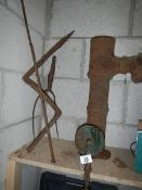 A cast garden pump and other metal ware.