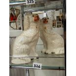 A pair of Staffordshire dogs.