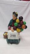 A Royal Doulton figure 'The Old Balloon Seller' HN1315