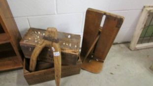 Two old wooden boxes and two other items.