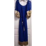 A Roland Klein royal blue and gold full length evening gown with interesting metallic cuffs and