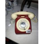 A vintage red & cream dial telephone