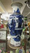 An Oriental blue and white vase.