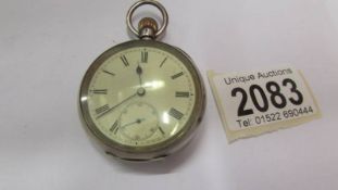 A silver pocket watch (not working).