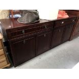 A Nathan dark wood stained 2 drawer, 4 door sideboard, 165 x 46 x73 cm high.