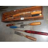 A tray of tools including wood turning chisels.