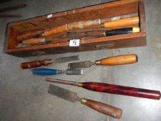 A tray of tools including wood turning chisels.