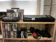 A vintage Commodore 16 & quantity of mainly Spectrum games (over 40 cased & quantity of uncased) -