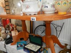 A small oval pine table.