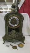 A Victorian Beulle mantel clock in good working order and in good condition with no lifting of