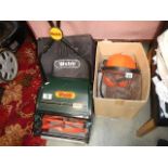 A good Webb manual mower, guard hat and other tools.