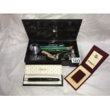 A box of miscellaneous including Schaefer propeller pencil & Martell lighter etc.