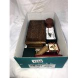 A box of miscellaneous including pill boxes, tie clips,