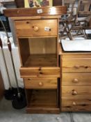 A pair of solid pine bedside cabinets