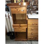 A pair of solid pine bedside cabinets