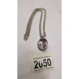 A heavy quality silver pendant set oval amethyst on a belcher link chainr, 48 grams.