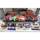 A selection of Lledo Guinness, Hamley's, Pepsi, Stanley Gibbons diecast models,