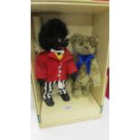 A Steiff Jolly Golly and Bear set in original box.