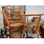 An old cane chair and table.