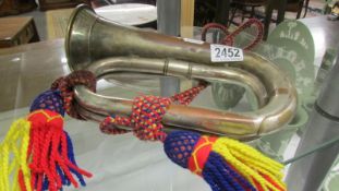 An old brass bugle.