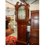 An oak cased grandfather clock by W Farnhill, Rotherham.