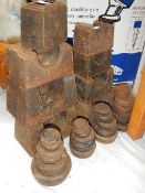 A large quantity of old metal weights.