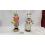 Two Beswick figurines - Mrs Rabbit baking and Gardener Rabbit.