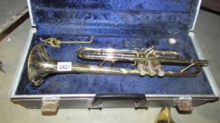 A cased Boosey & Hawkes 'Besson' trumpet.