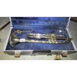 A cased Boosey & Hawkes 'Besson' trumpet.
