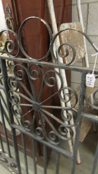 A decorative wrought iron garden gate. - Image 2 of 2