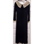 Slim fit black Polly Peck evening gown by Sybil Zelker with decorative cream collar trim â€“ Size