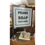 An oak firescreen with Pear's soap signage.