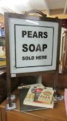 An oak firescreen with Pear's soap signage.