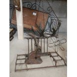 A mixed lot of metal ware including woodpecker door knocker, horse shoe hanging basket etc.