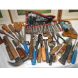 A mixed lot of chisels, spanners etc.